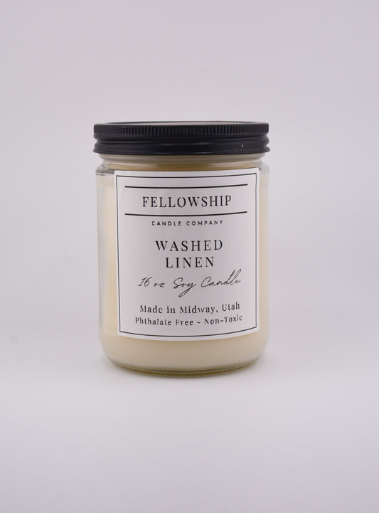 Washed Linen Candle with a label on a white background