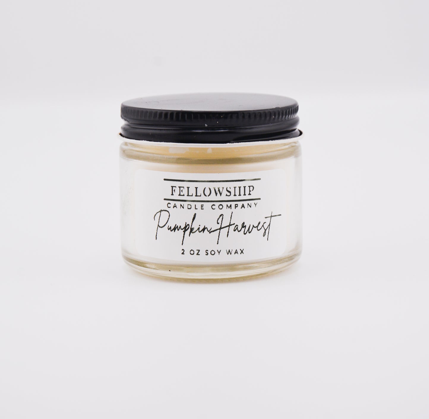 Jar of Fellowship Candle Company Pumpkin Harvest candle on a white background