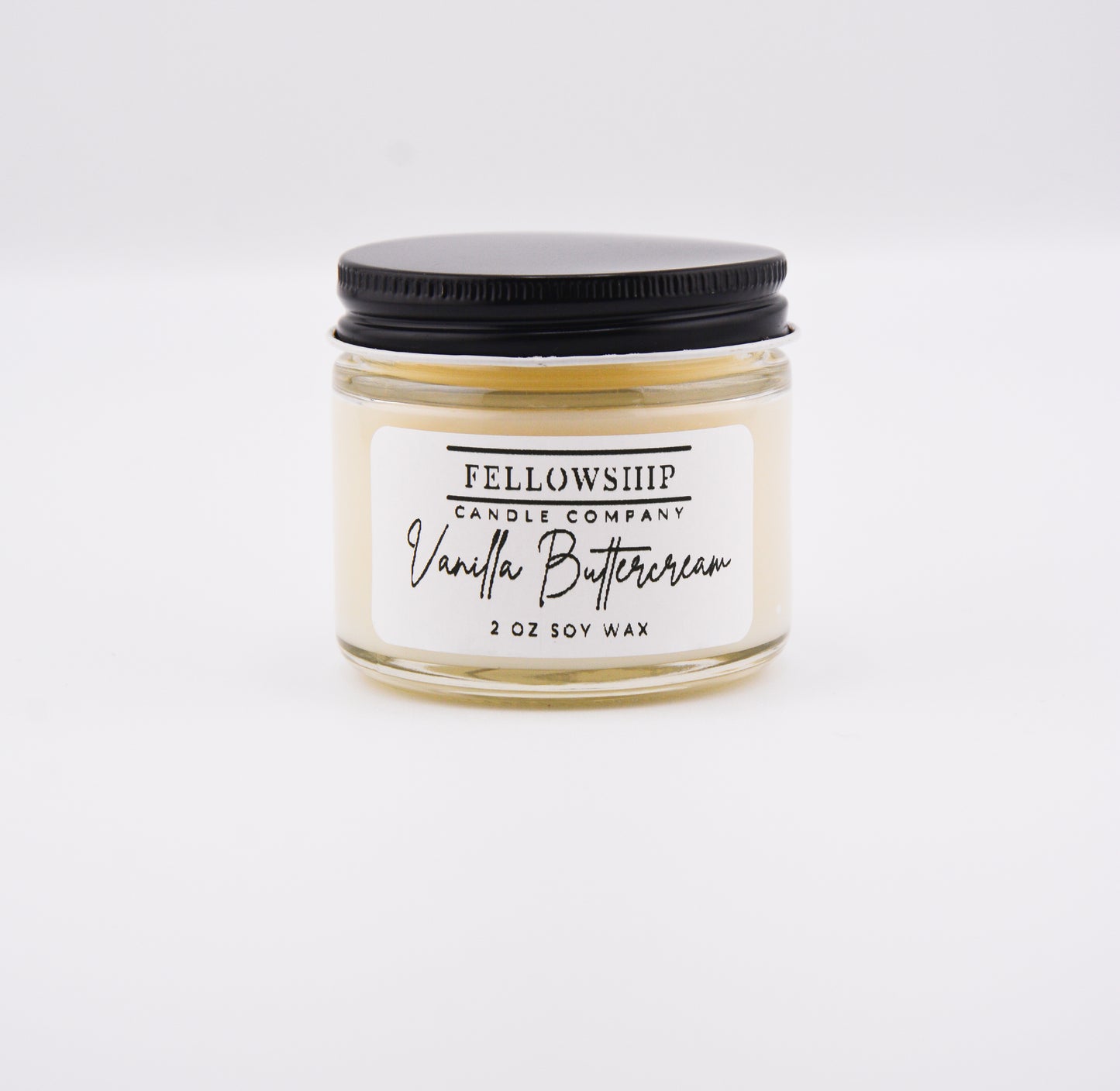 Jar of Vanilla Buttercream candle from Fellowship Candle Company on a white background