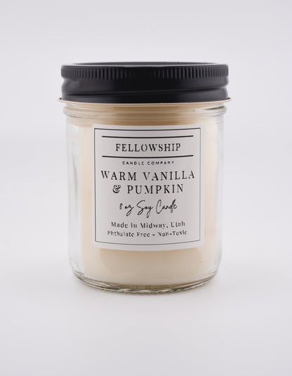 Candle with a label on a white background