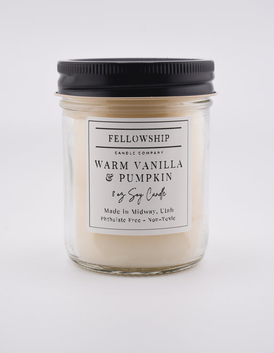 Candle with a label on a white background