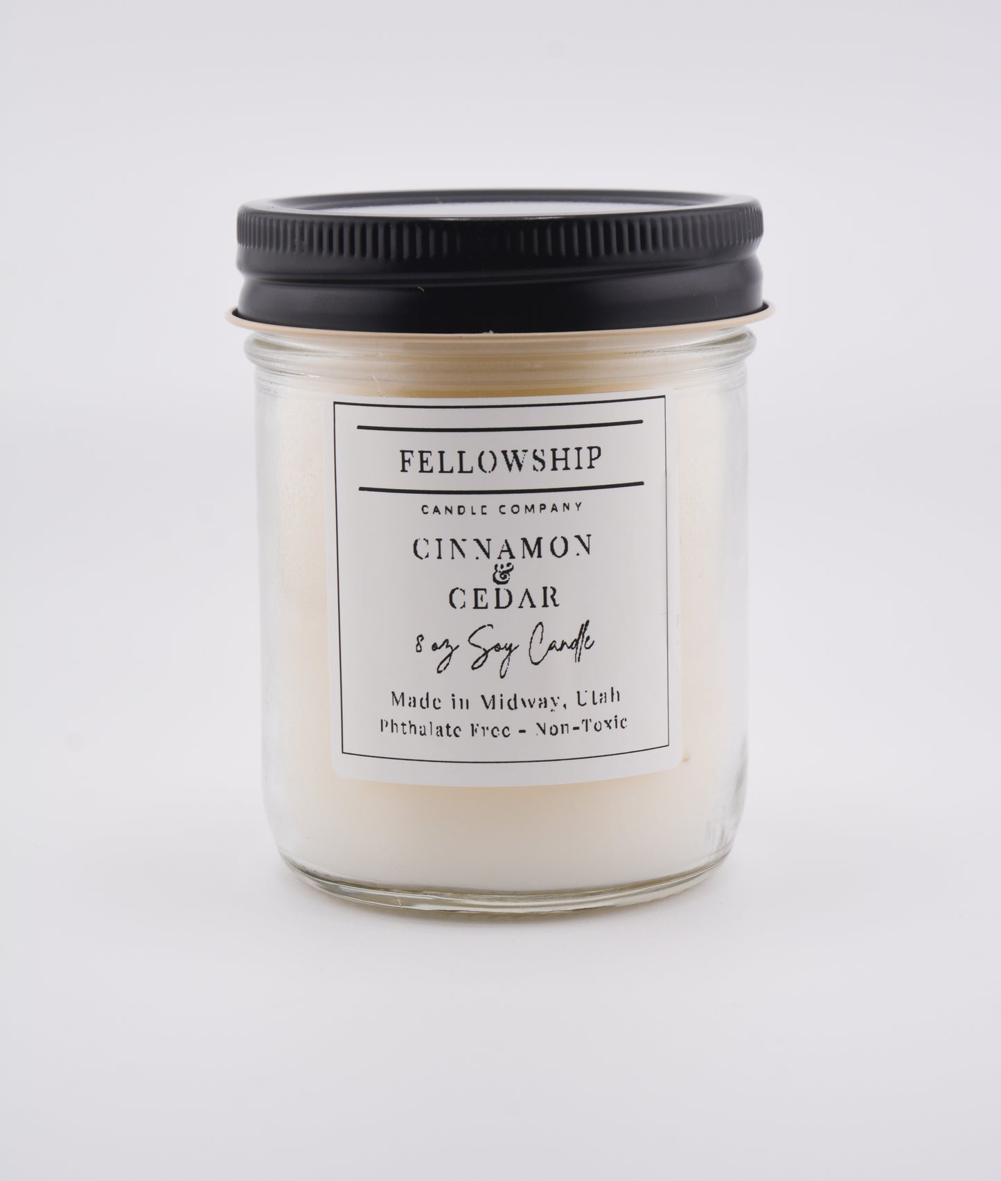 Candle with a label on a white background