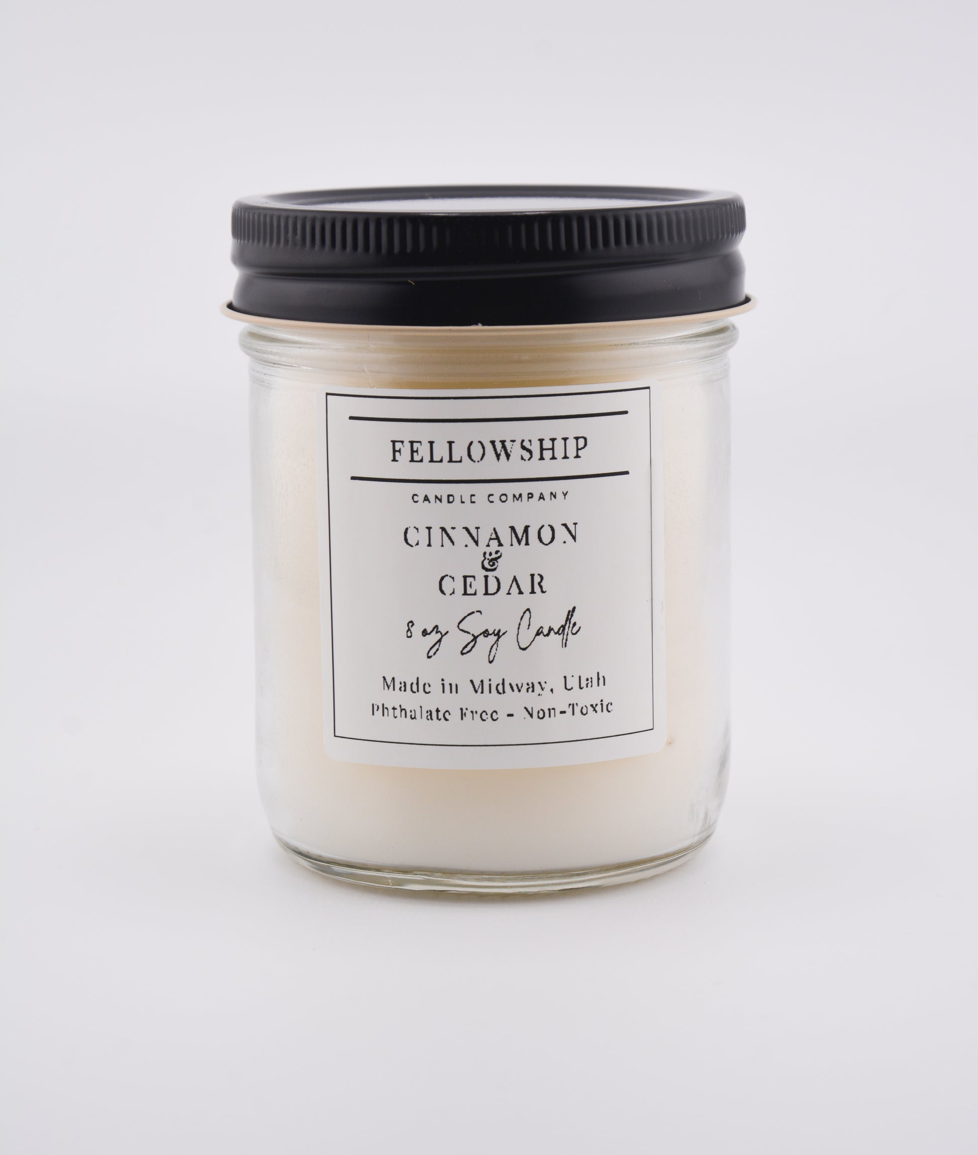 Candle with a label on a white background