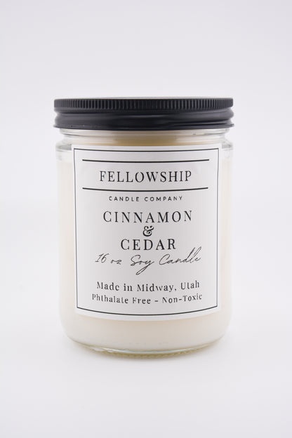 Candle jar with 'Fellowship Candle Company' label on a white background