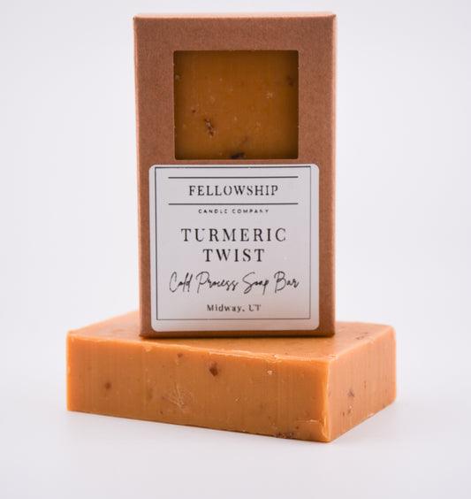 Bar of soap with a 'Fellowship Candle Company' label on a white background